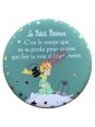 Magnet rond le Petit Prince assis et la Rose chez Souvenirsdelyon.com