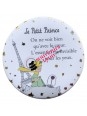 Magnet rond le Petit Prince assis sur sa planète sous la Tour Eiffel chez Souvenirsdelyon.com